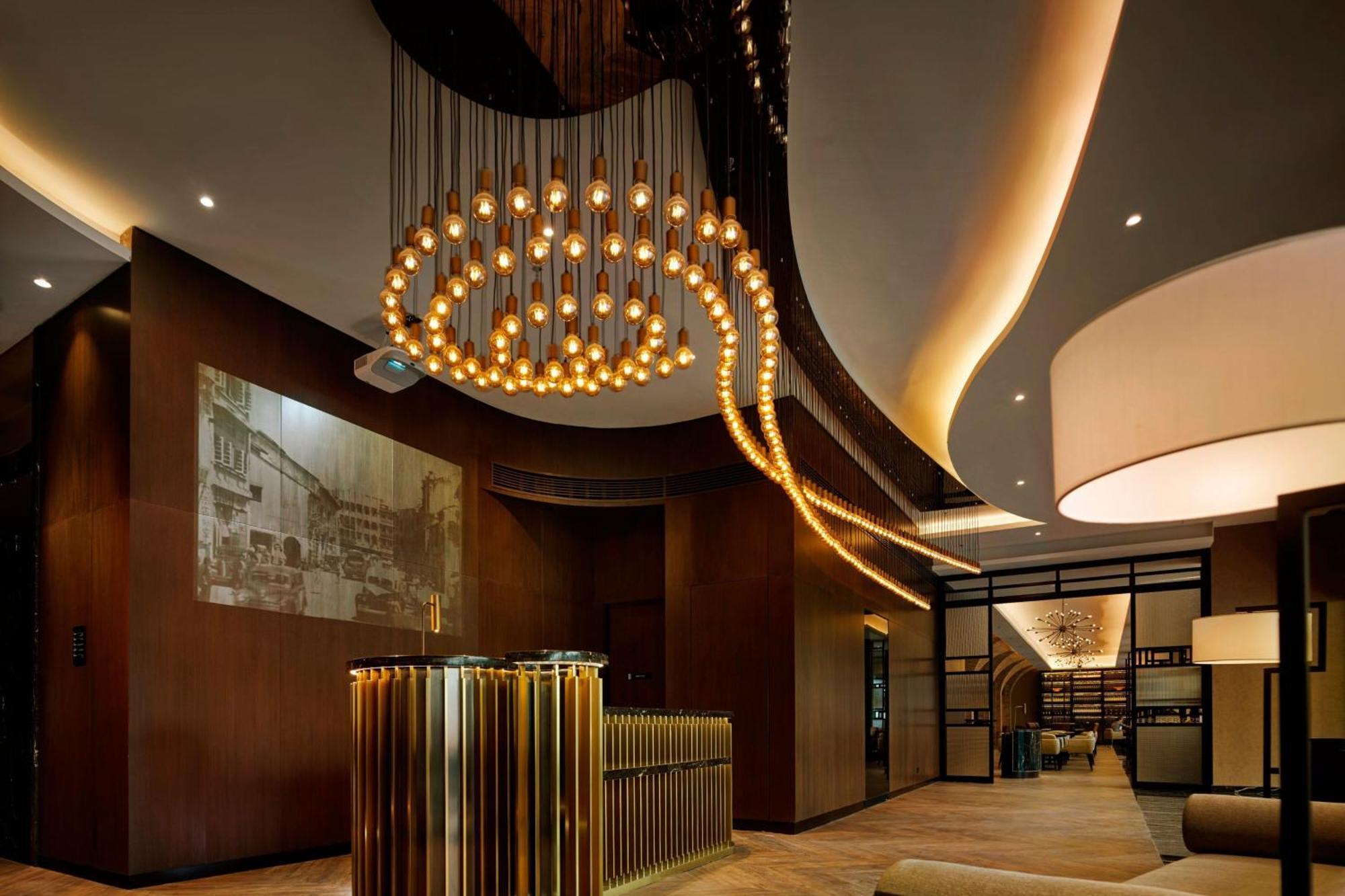 Hotel Stripes Kuala Lumpur, Autograph Collection Exterior foto The lobby of the hotel