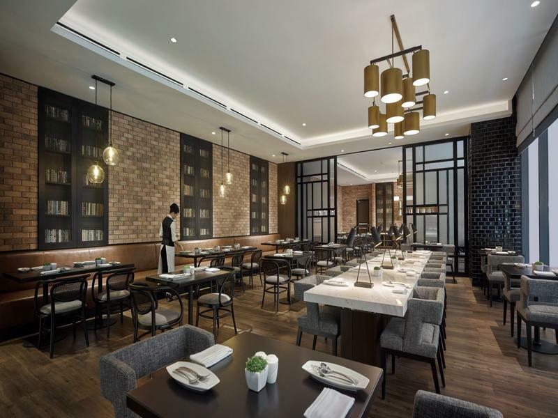 Hotel Stripes Kuala Lumpur, Autograph Collection Exterior foto The interior of the restaurant